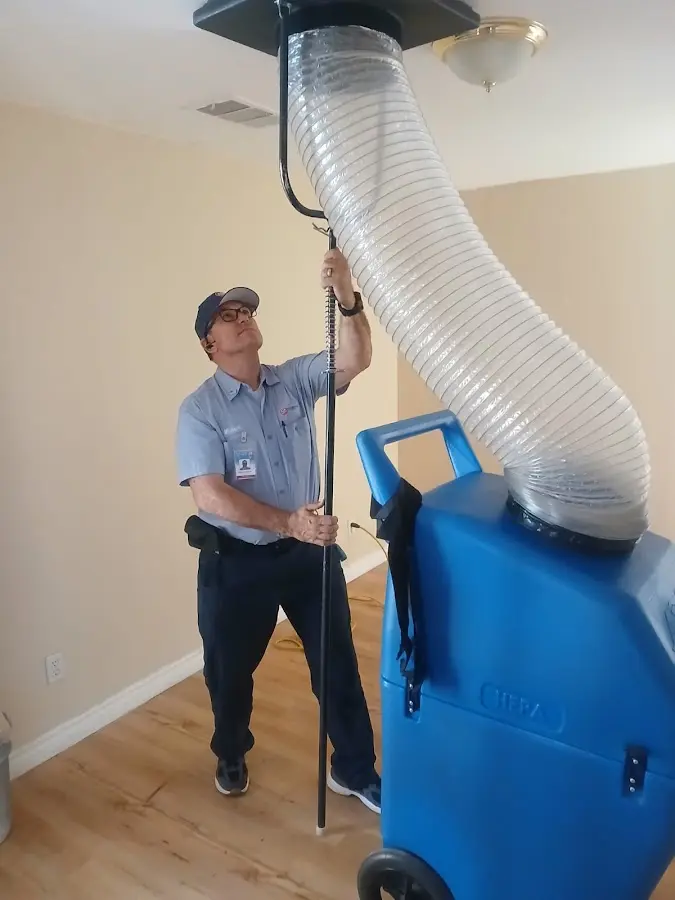 HVAC Installation technician using HEPA equipment in Krum